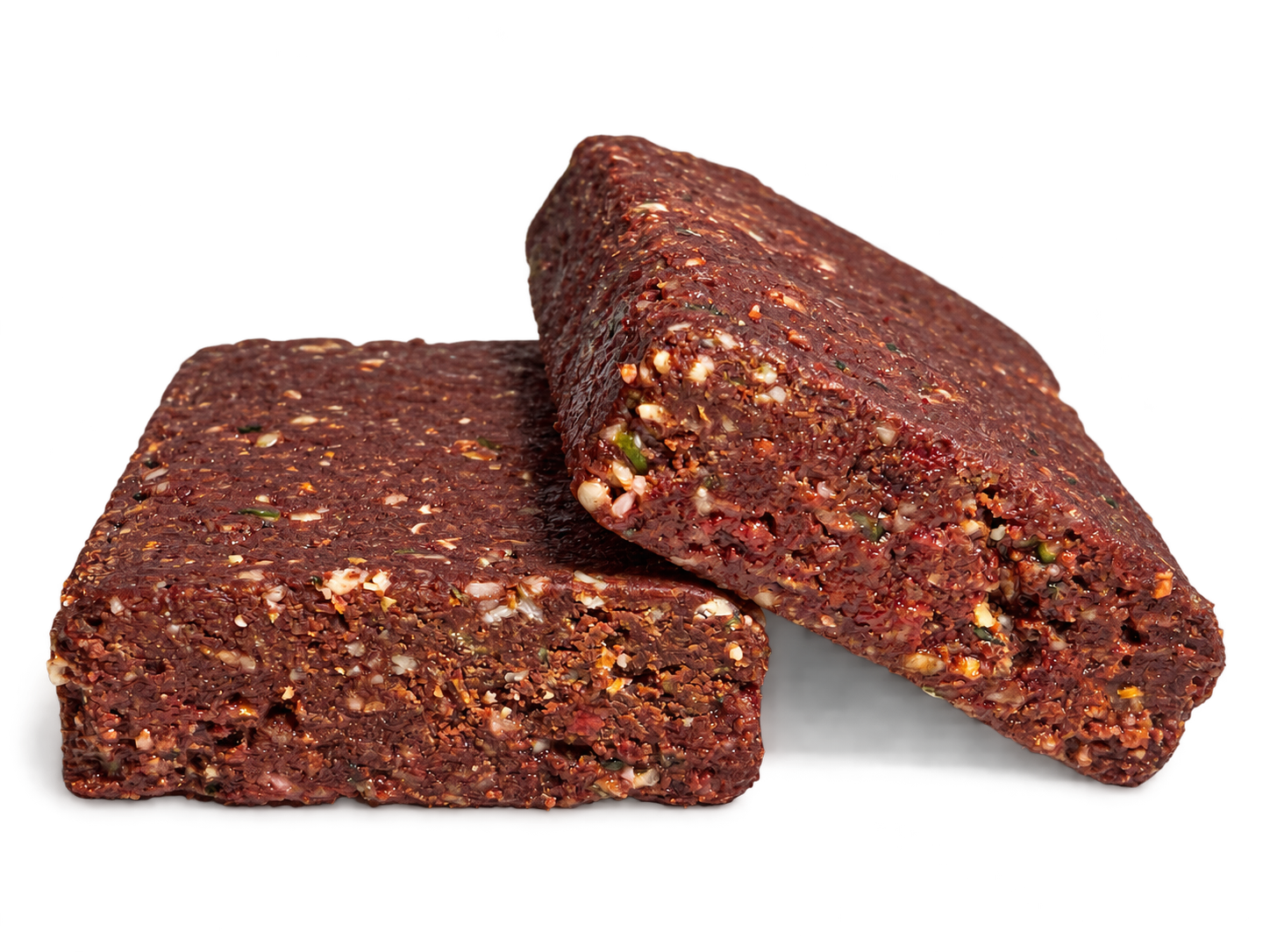 kardía bars with a cut surface showing cacao, nuts, and seeds